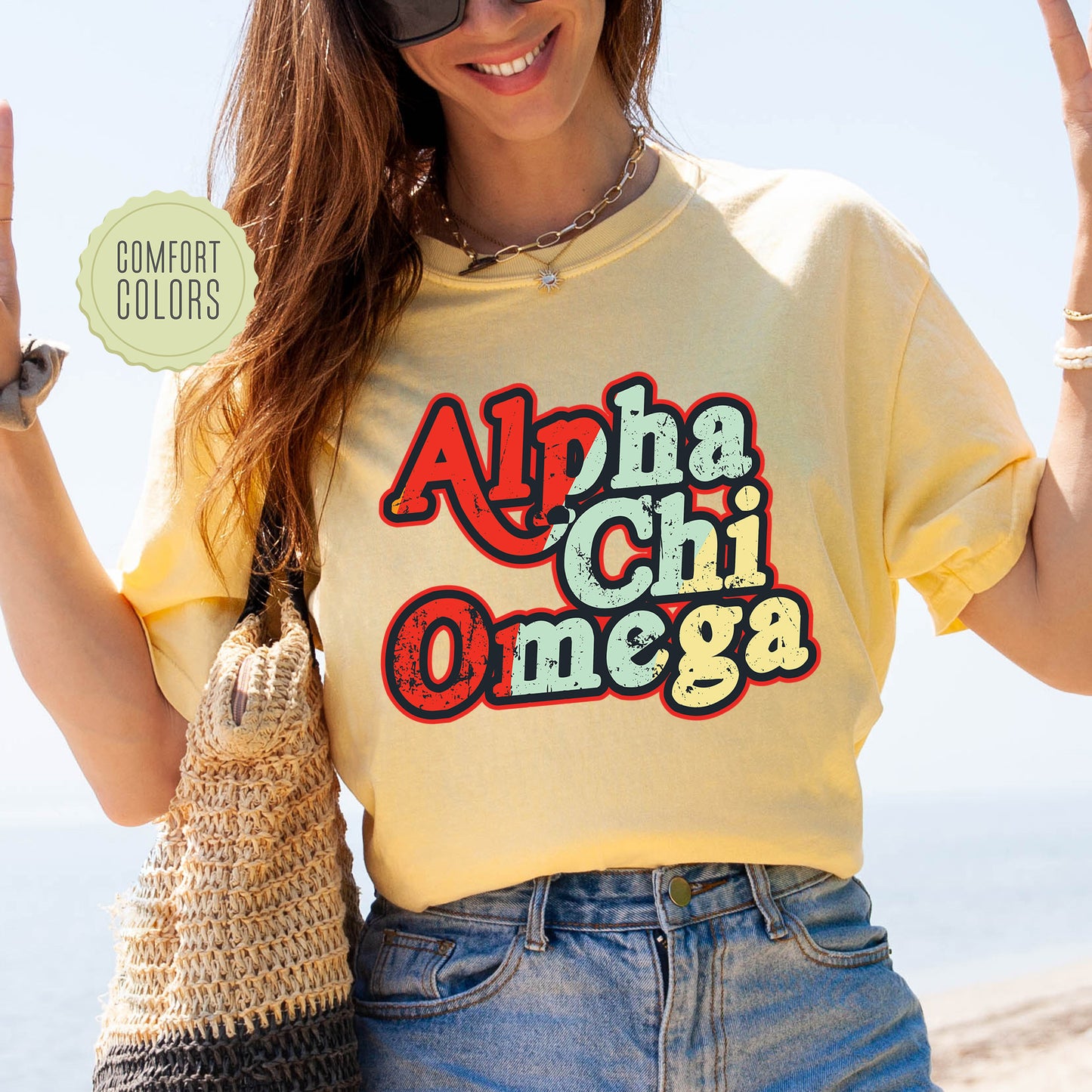 a woman wearing a yellow shirt with the words aloha chii onega