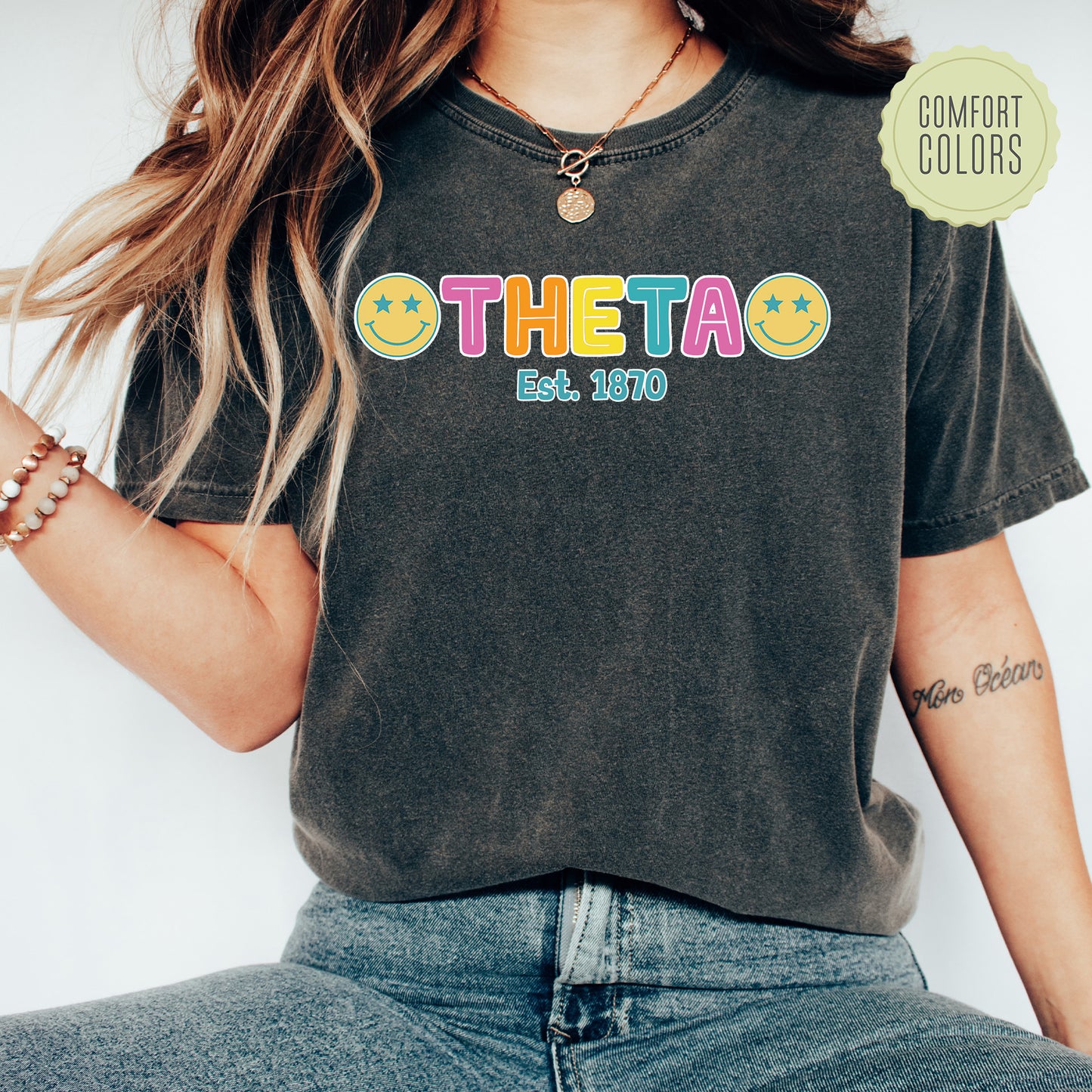 a woman wearing a black shirt that says the taco