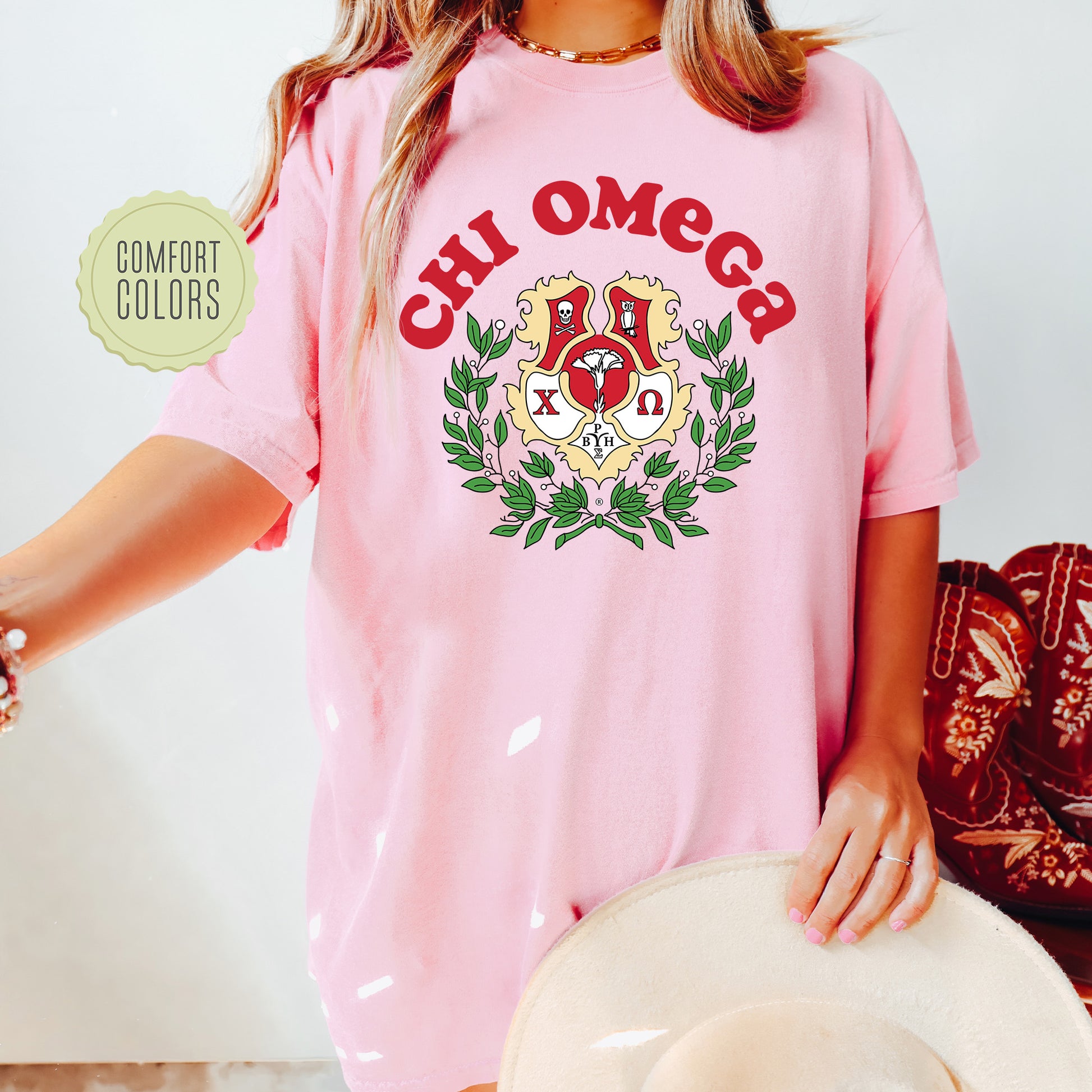 a woman wearing a pink shirt and hat