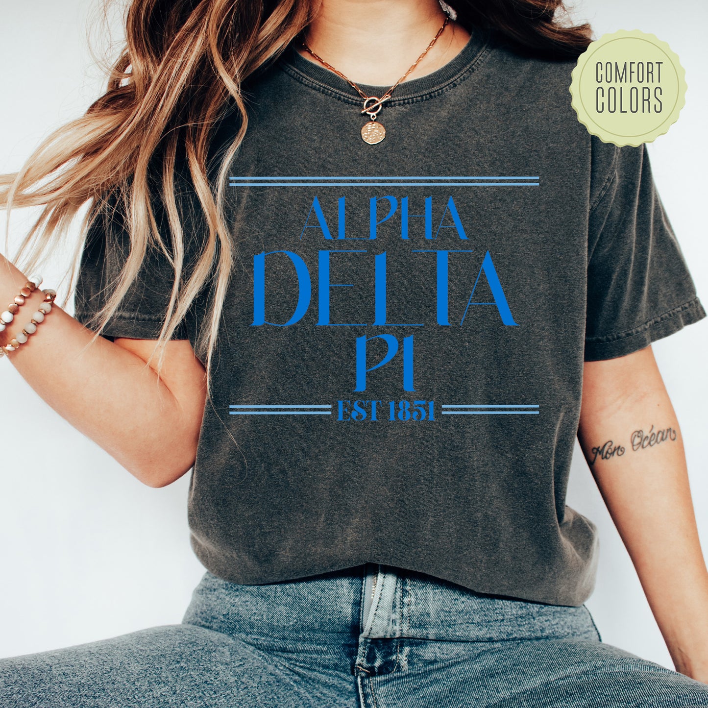a woman wearing a t - shirt that says appia delia p