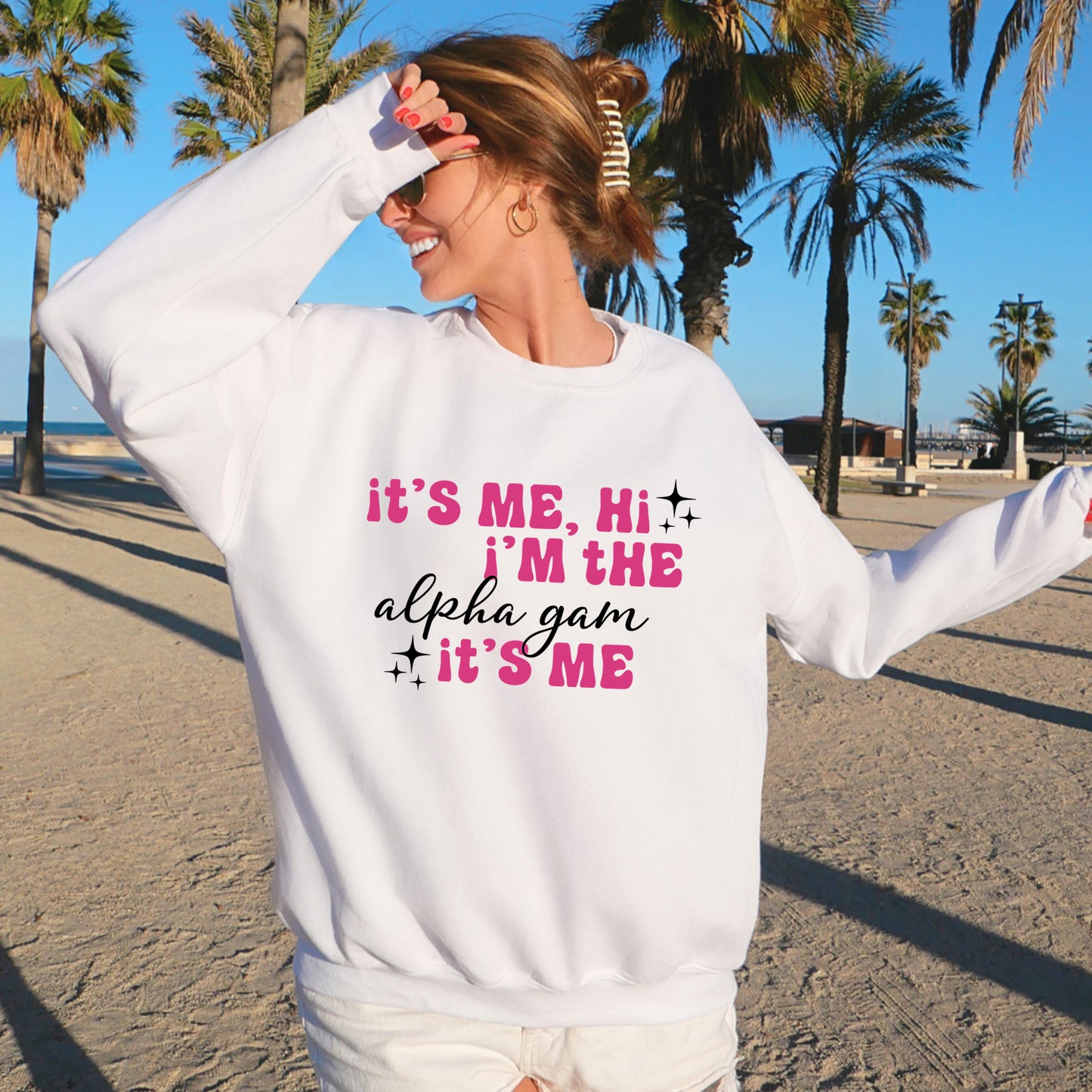 a woman wearing a sweatshirt that says it's me, i'm the