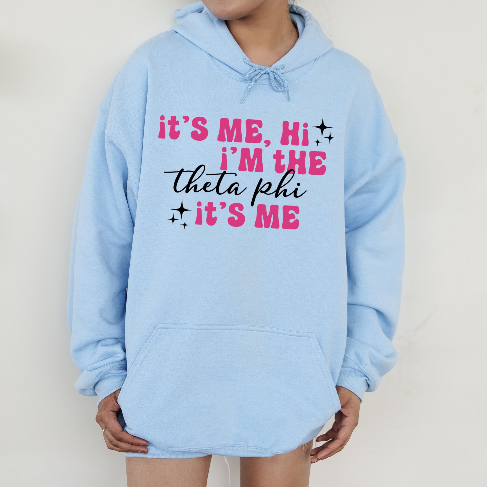 a person wearing a blue hoodie that says it's me, i '