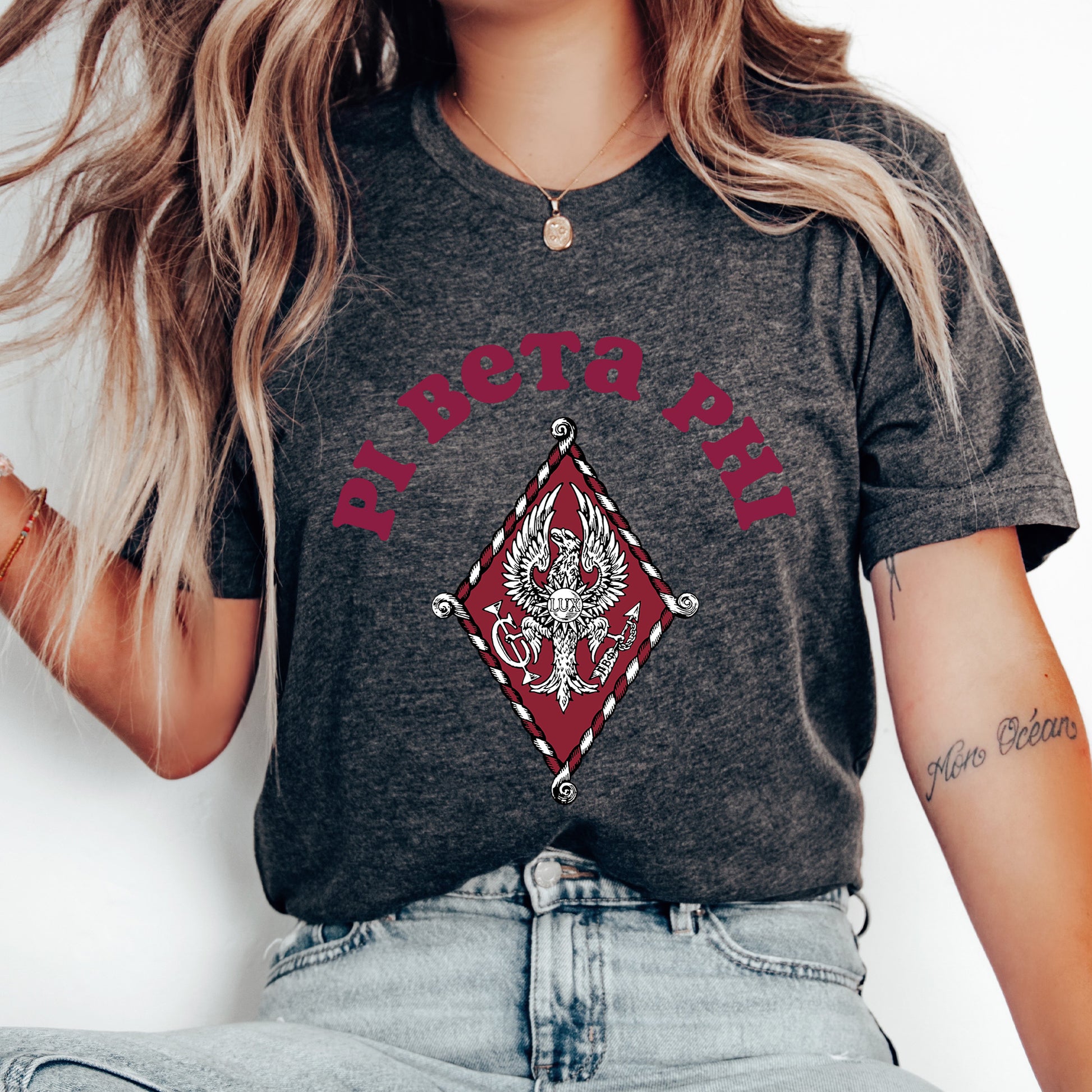 a woman wearing a t - shirt with a design on it