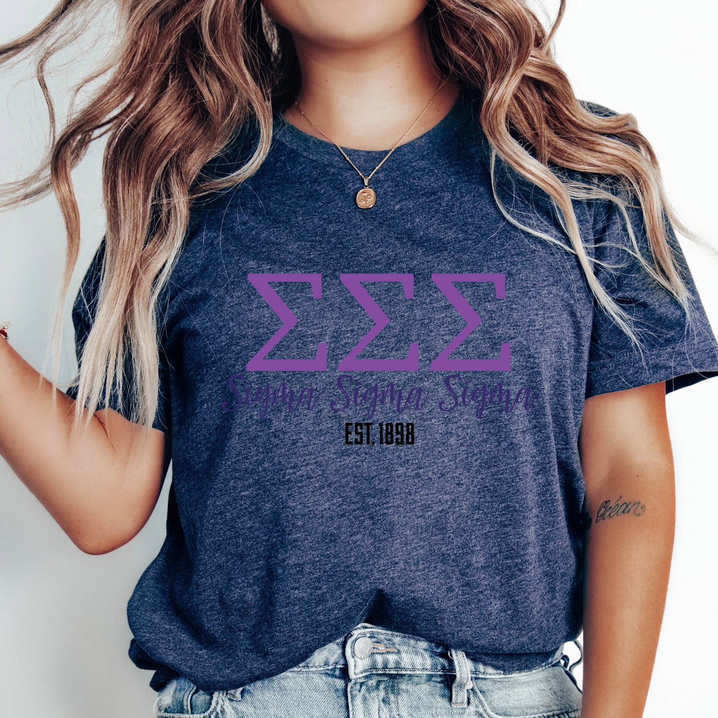 a woman with long hair wearing a t - shirt