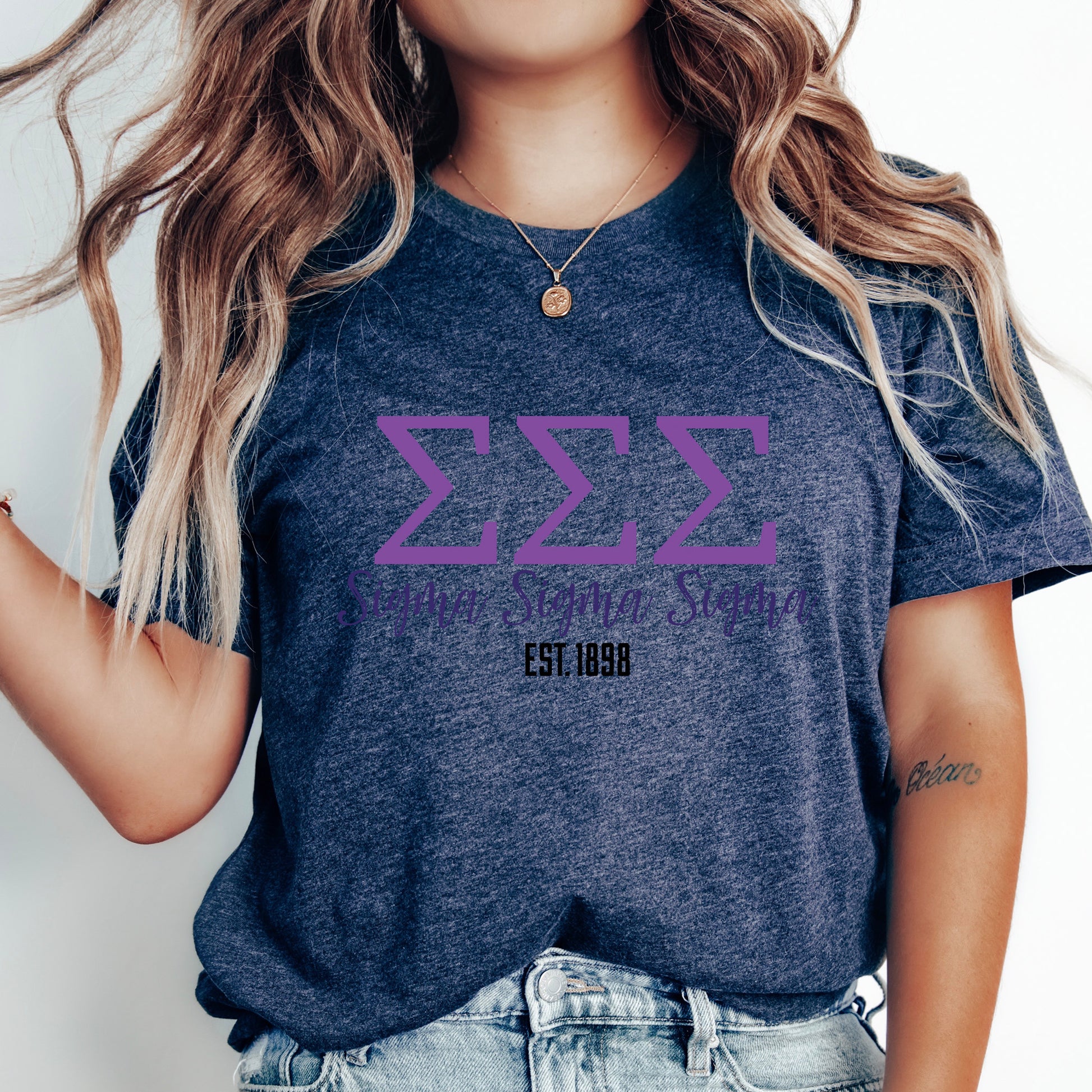 a woman with long hair wearing a t - shirt