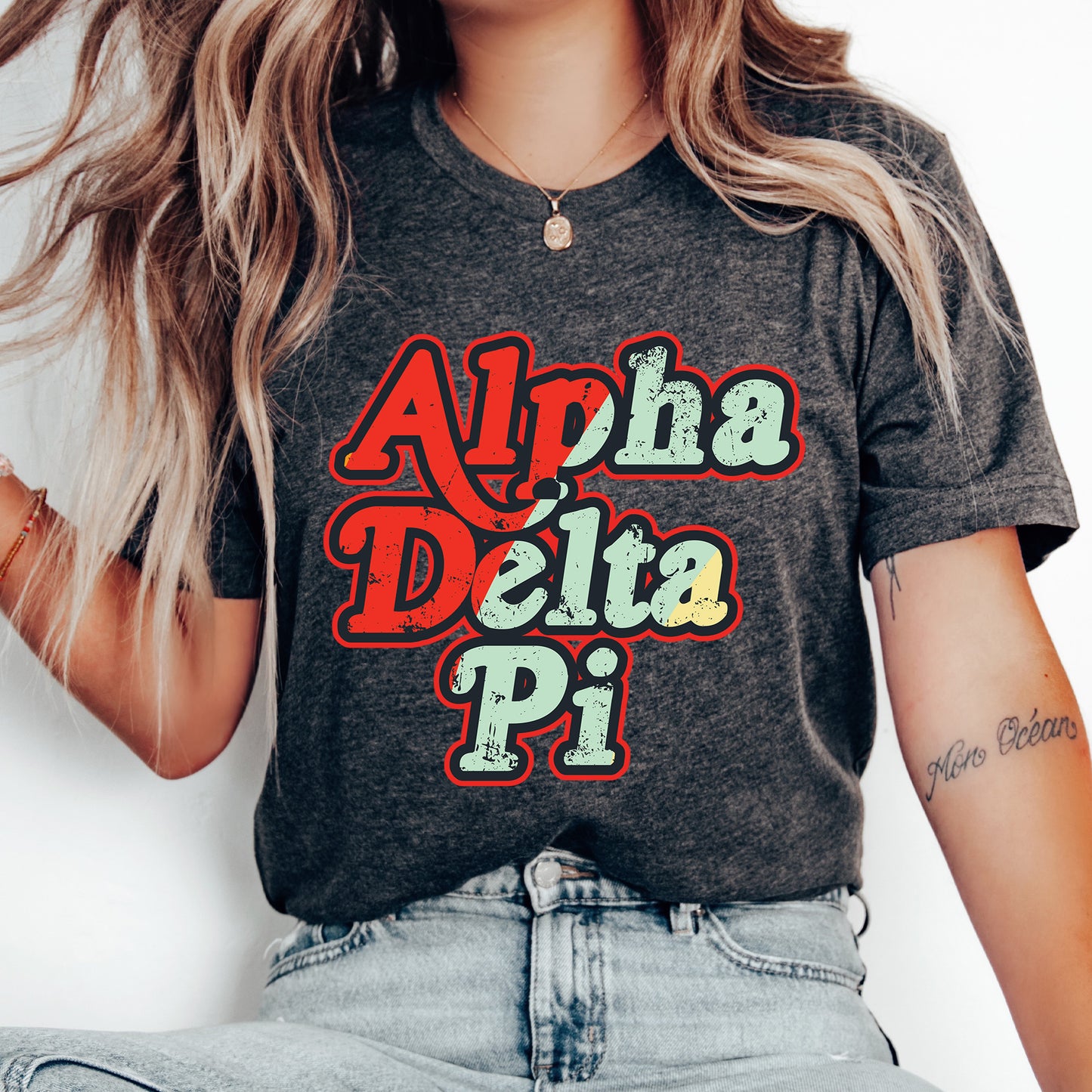 a woman with long hair wearing a shirt that says aloh delta pi