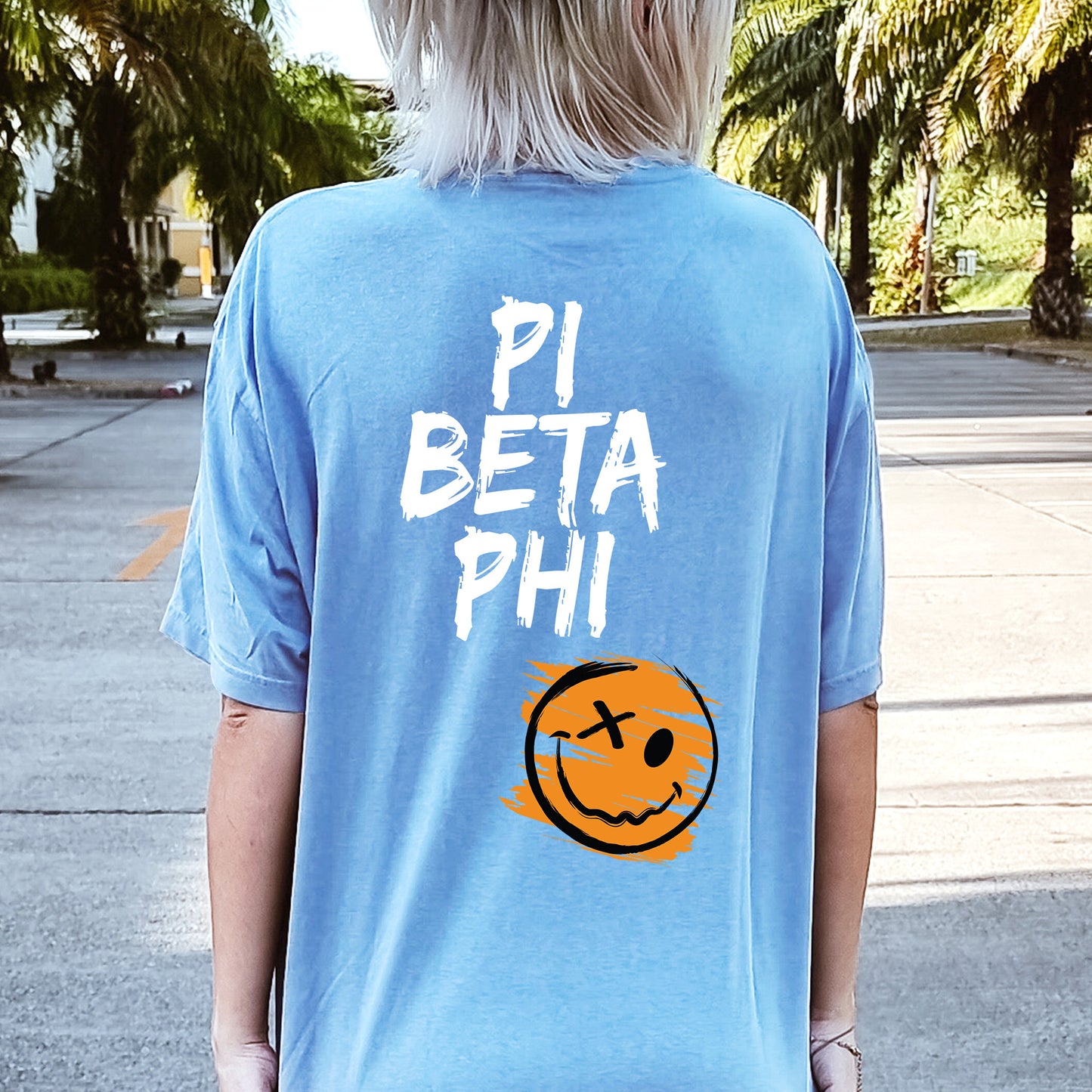 a person wearing a shirt that says pi beta phi