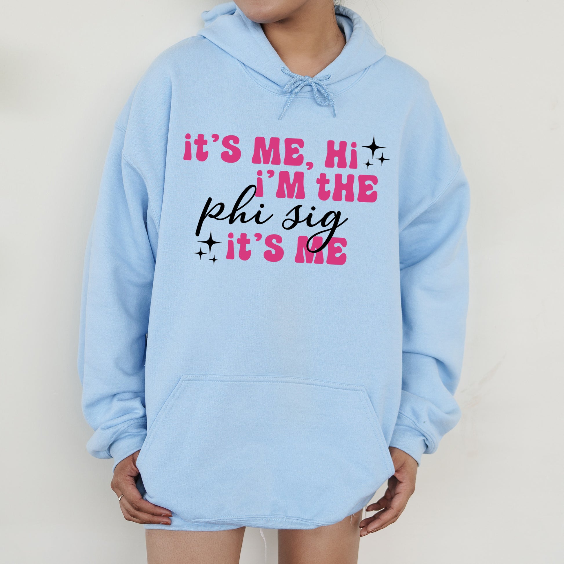 a person wearing a blue hoodie that says it's me, i '