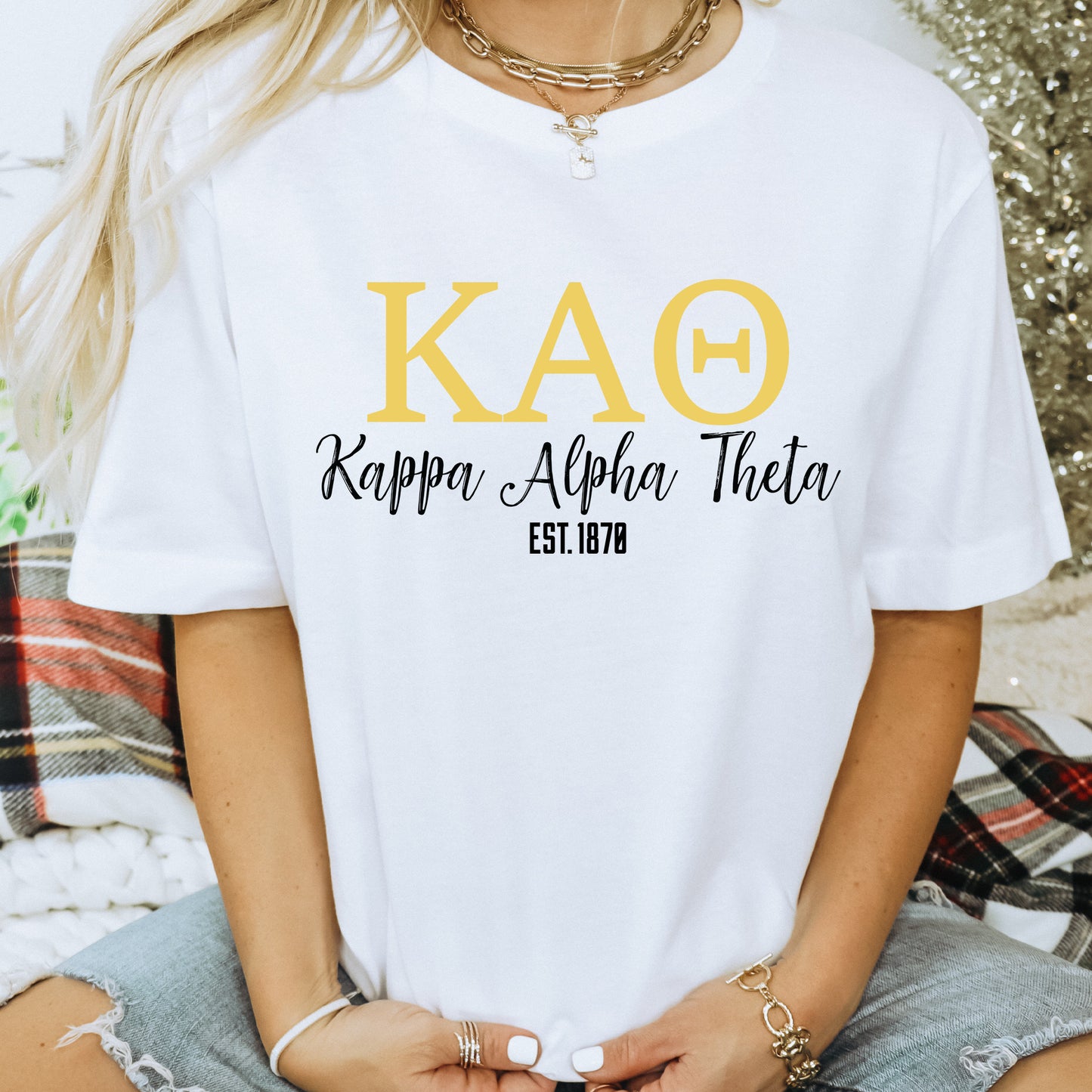 a woman wearing a white shirt that says kao rappa - aloh tho