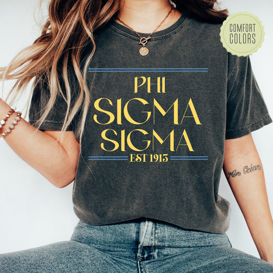 a woman wearing a phi sigma t - shirt