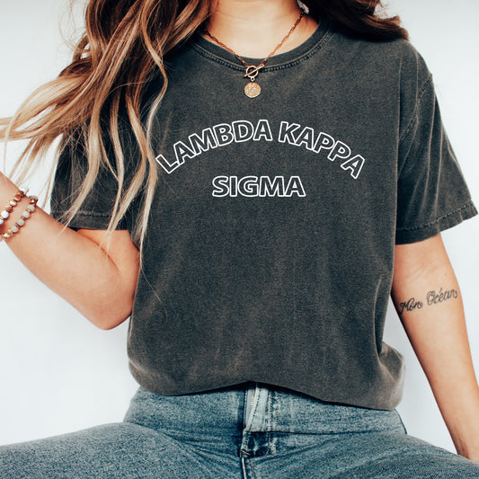 a woman wearing a shirt that says lambda kapa sigma