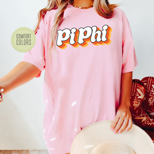 a woman wearing a pink shirt with the word pippi on it