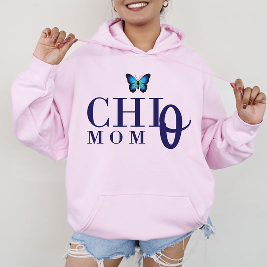a woman wearing a pink hoodie with a butterfly on it