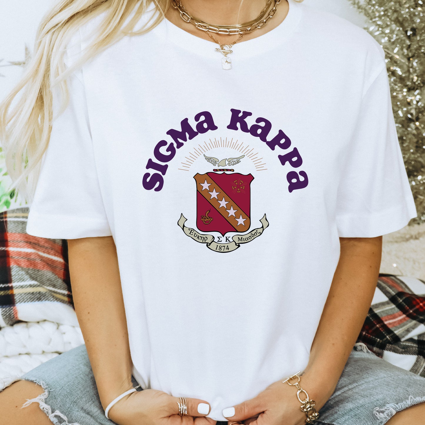 a woman wearing a t - shirt that says stigma karp