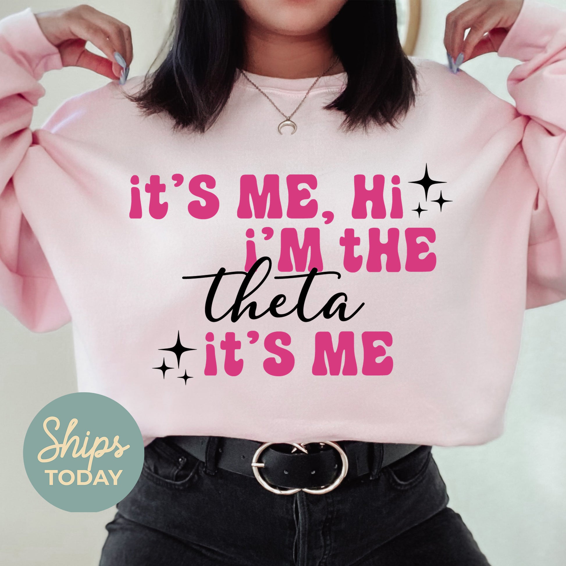 a woman wearing a pink sweatshirt that says it's me, i'm