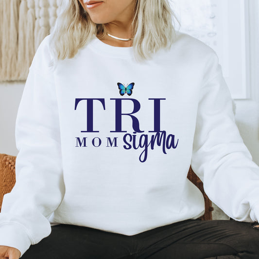 a woman sitting on a chair wearing a white sweatshirt