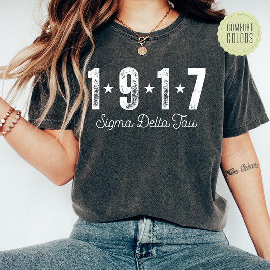 a woman wearing a t - shirt with the year 1971 printed on it
