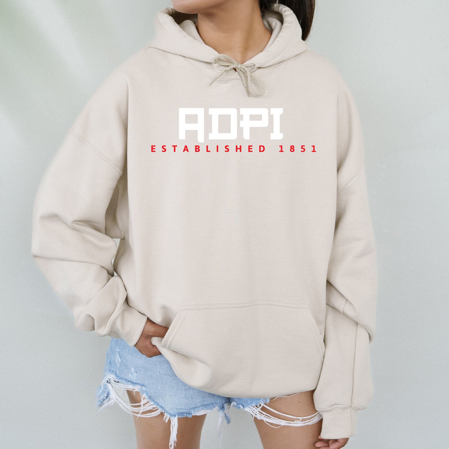 a woman wearing a sweatshirt with the word hope on it