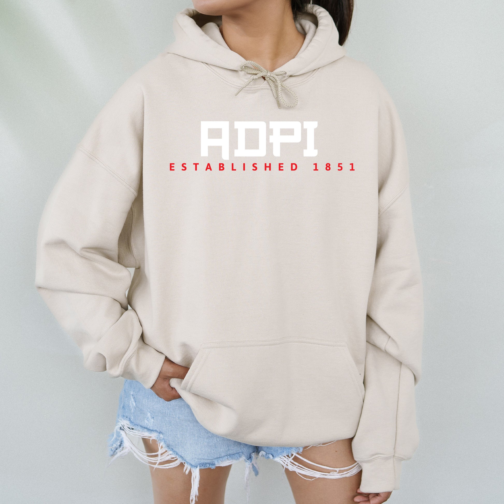 a woman wearing a sweatshirt with the word hope on it