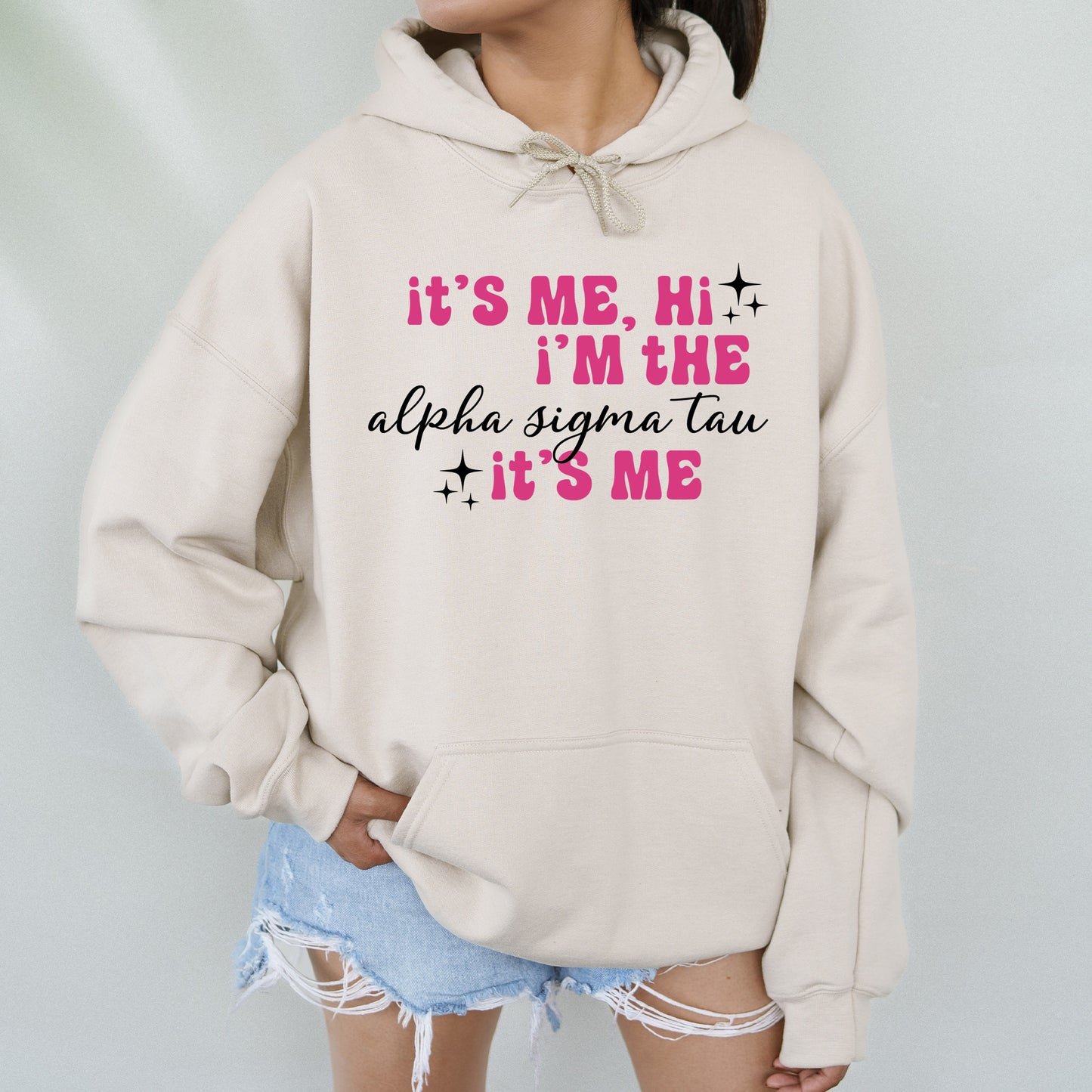 a woman wearing a sweatshirt that says it's me, i'm the