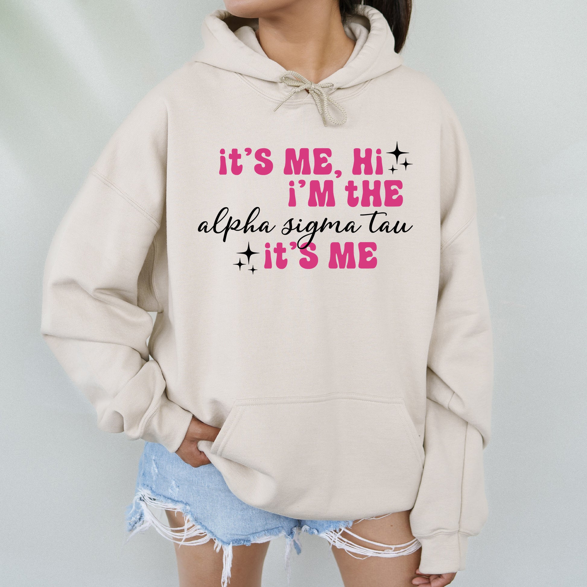 a woman wearing a sweatshirt that says it's me, i'm the