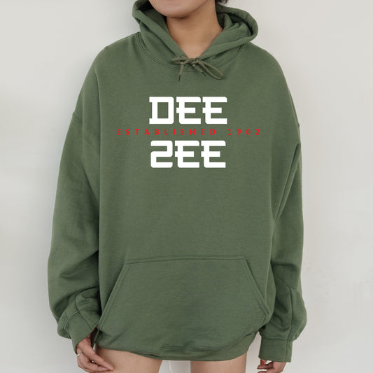 a person wearing a green hoodie with the words dee on it