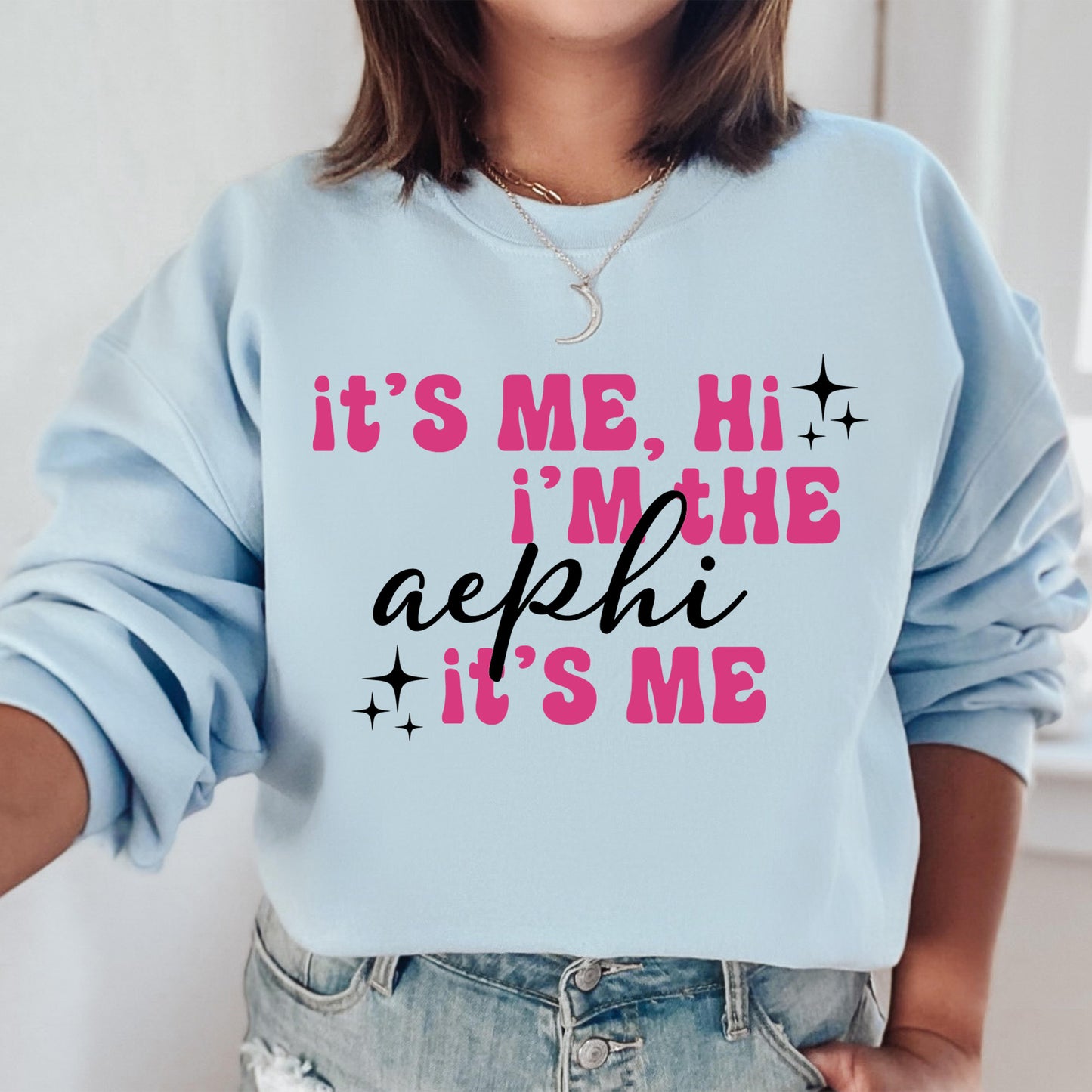 a woman wearing a sweatshirt that says it's me, i'm the