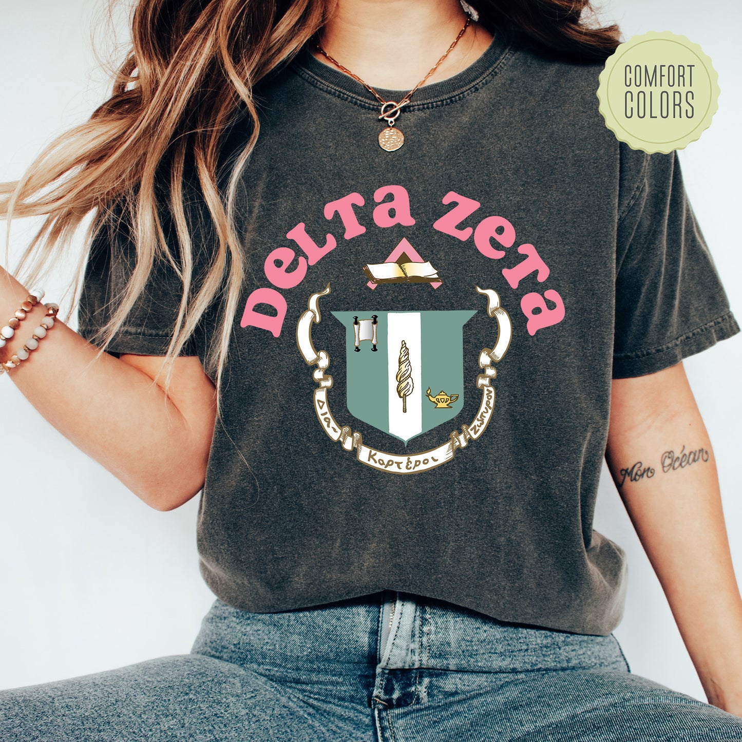 a woman wearing a t - shirt that says delta zero