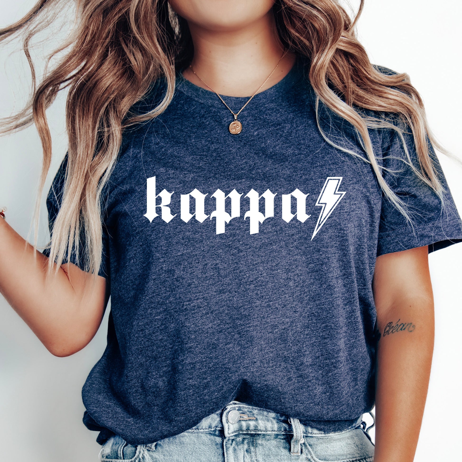 a woman wearing a shirt that says kappo