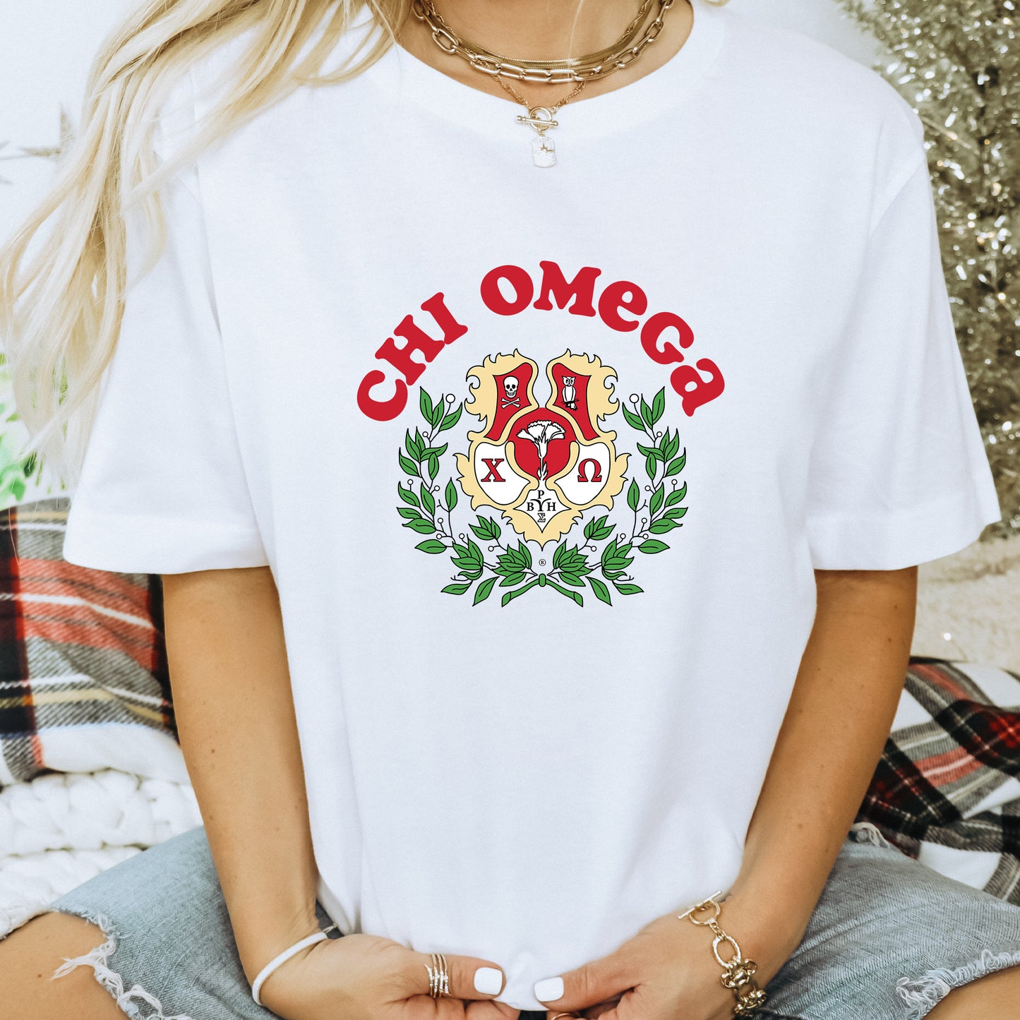 a woman wearing a white shirt with the word oh omeg on it