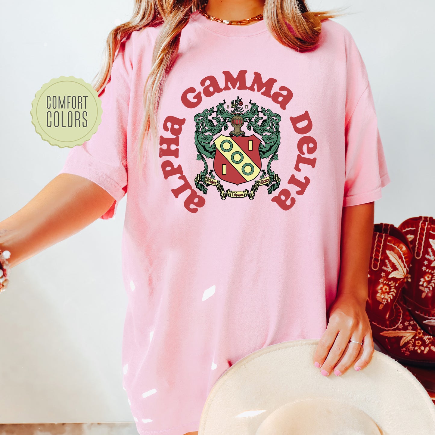 a woman wearing a pink shirt and hat