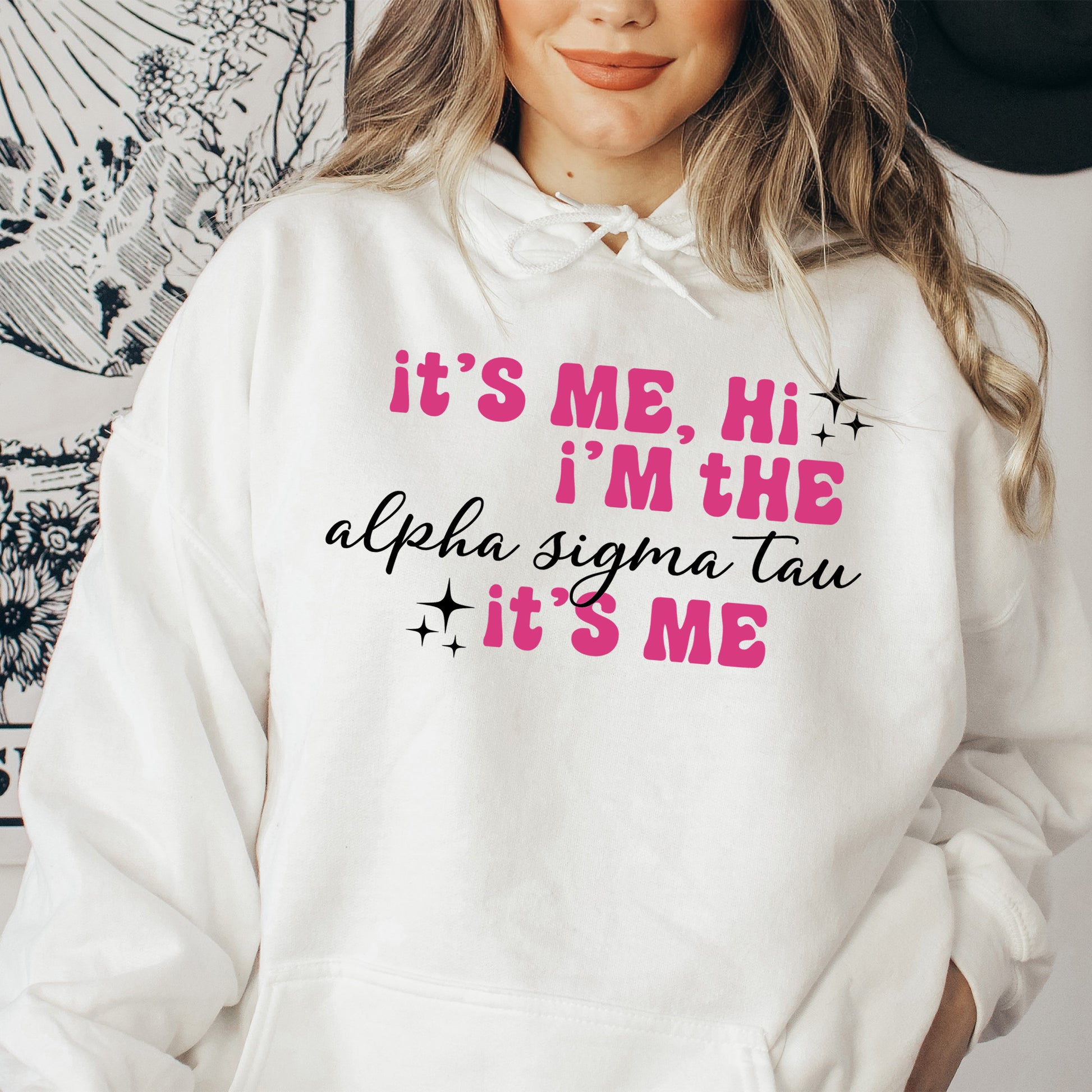 a woman wearing a white hoodie that says it's me, i '