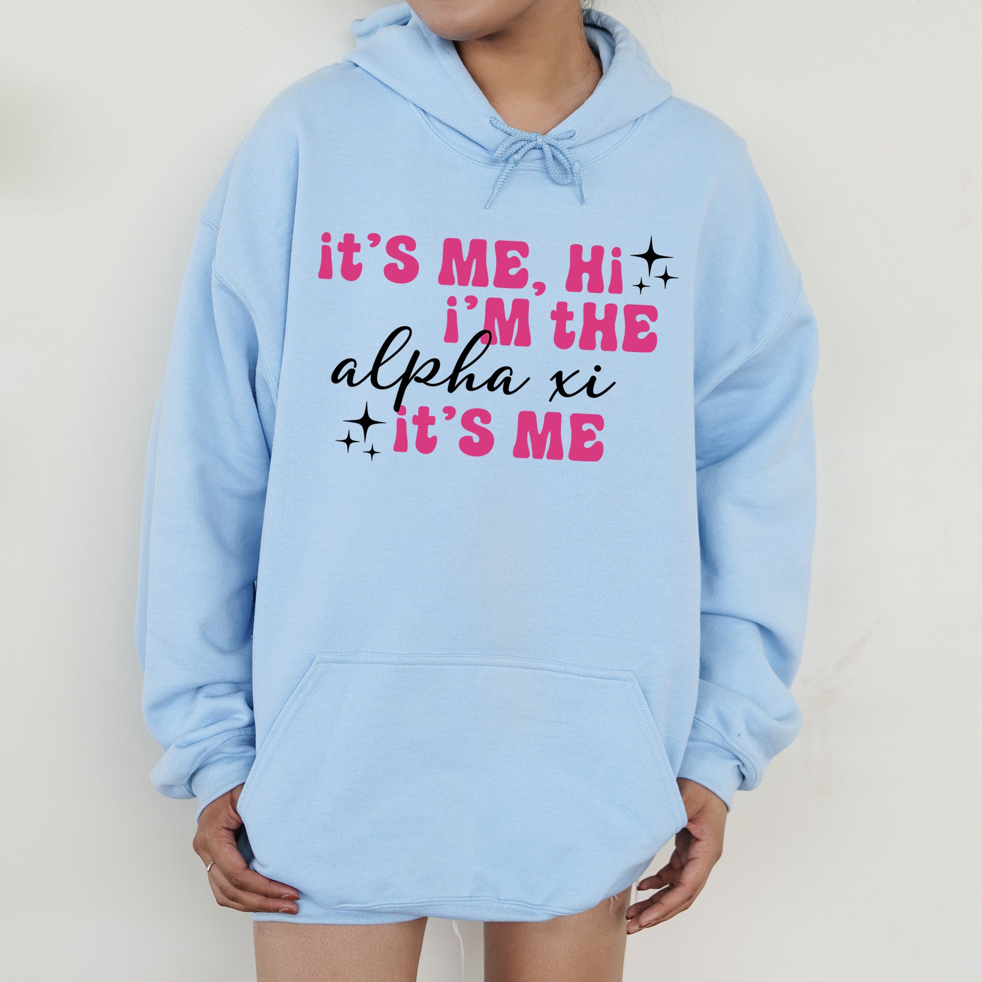 a person wearing a blue hoodie that says it's me, i '