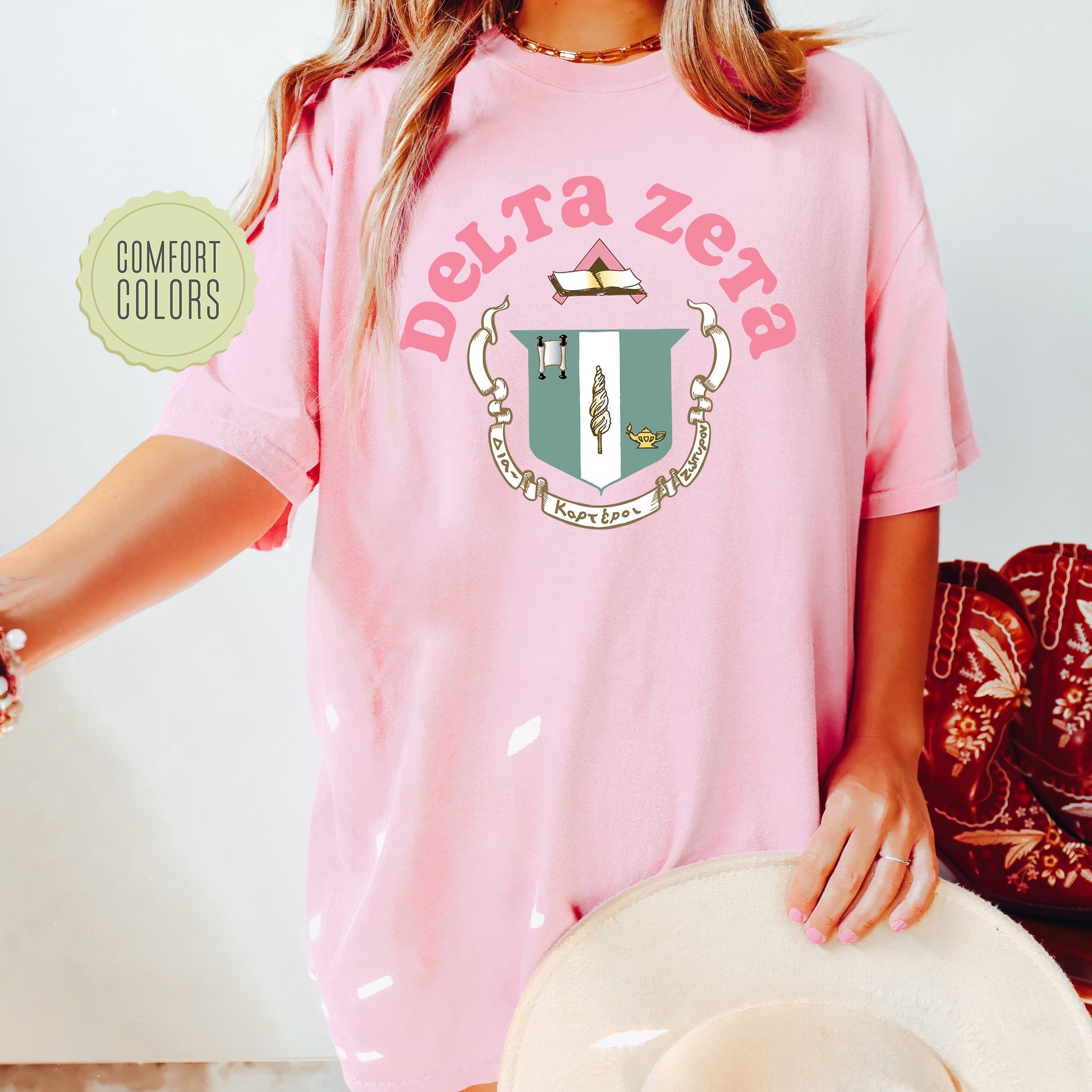 a woman wearing a pink shirt and hat