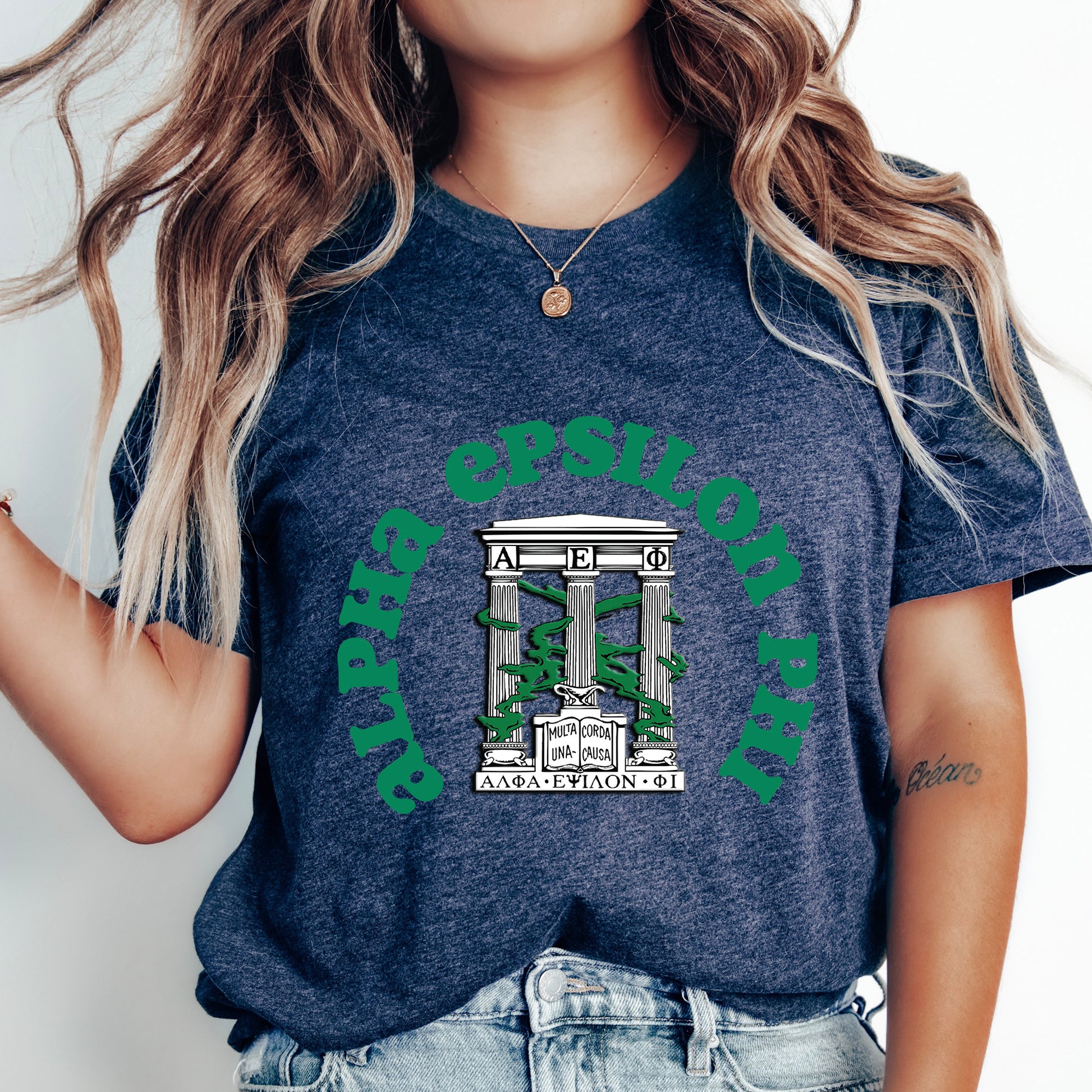 a woman wearing a t - shirt with a picture of a bridge on it