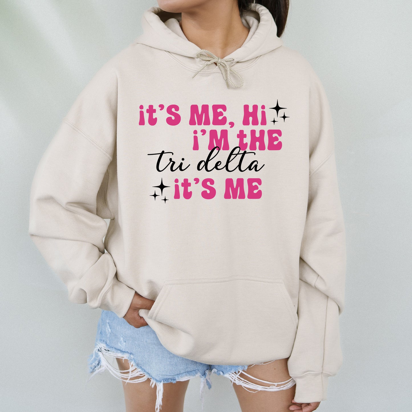 a woman wearing a sweatshirt that says it's me, i'm the