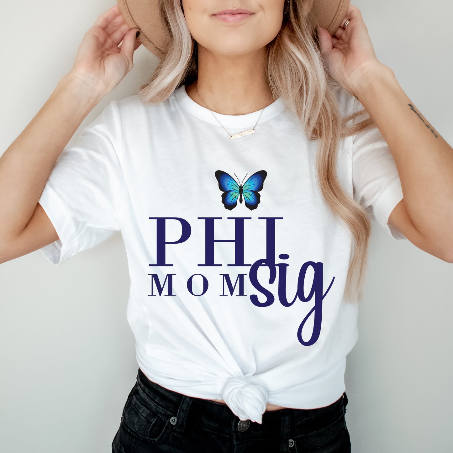 a woman wearing a hat and a t - shirt
