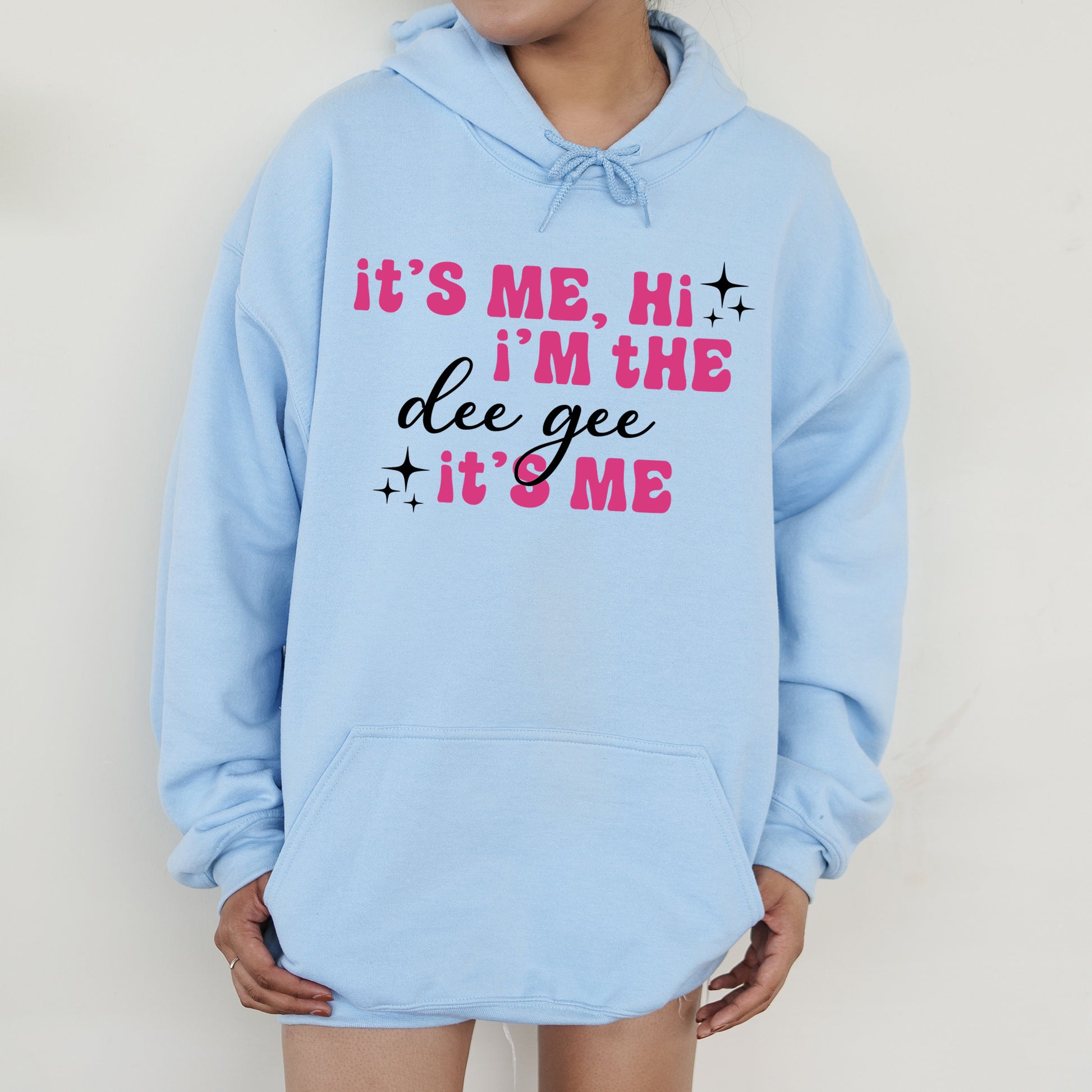 a person wearing a blue hoodie that says it's me, i '