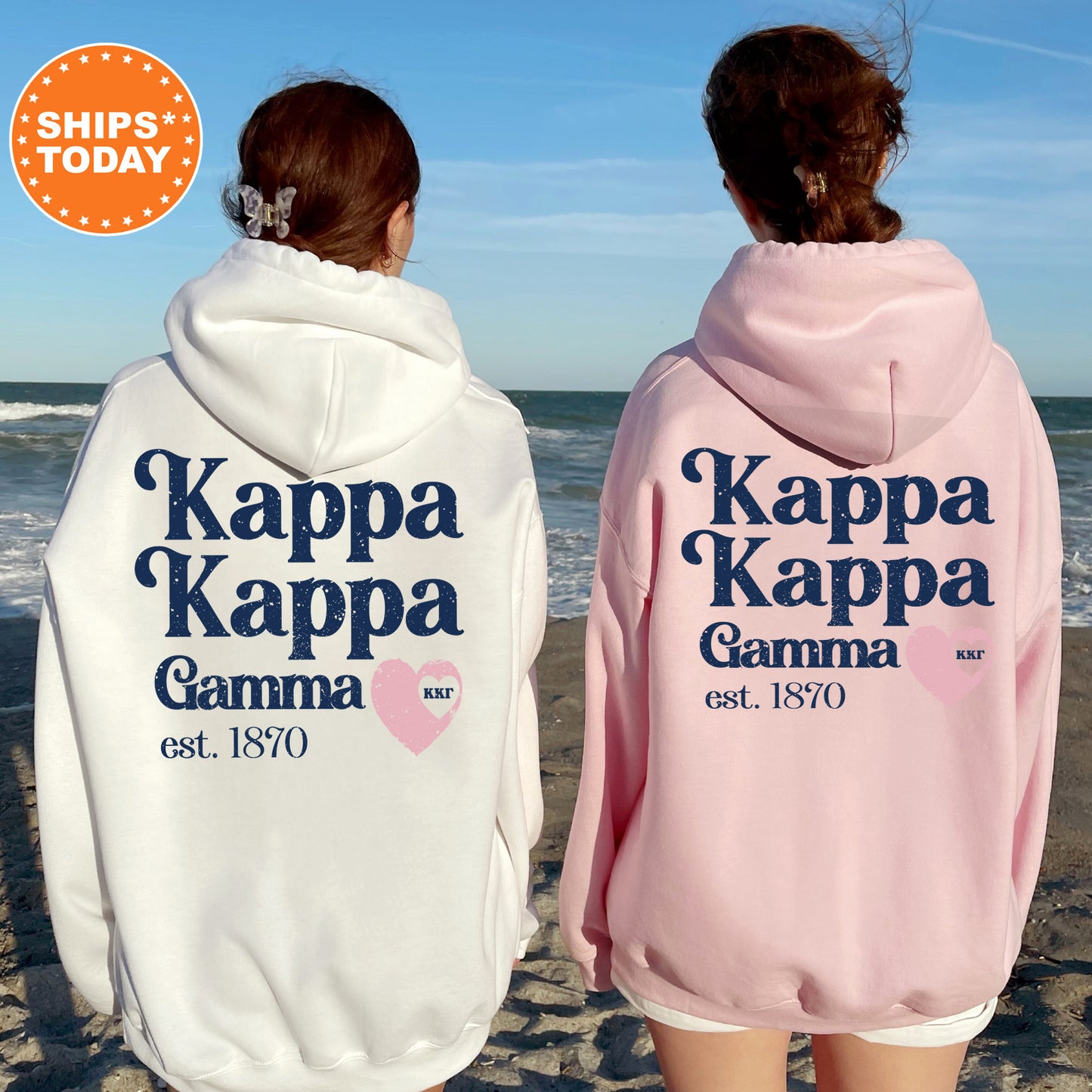 a couple of women standing next to each other on a beach