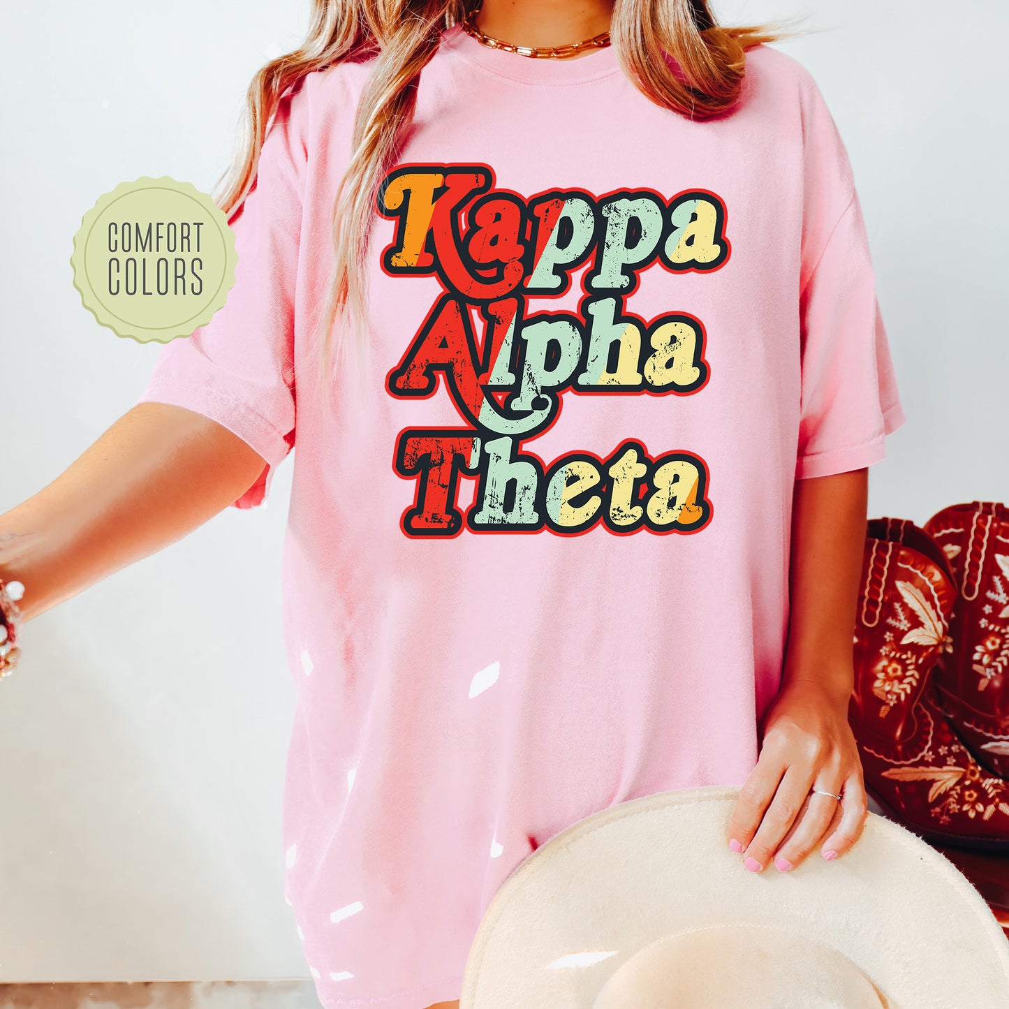 a woman wearing a pink shirt and hat