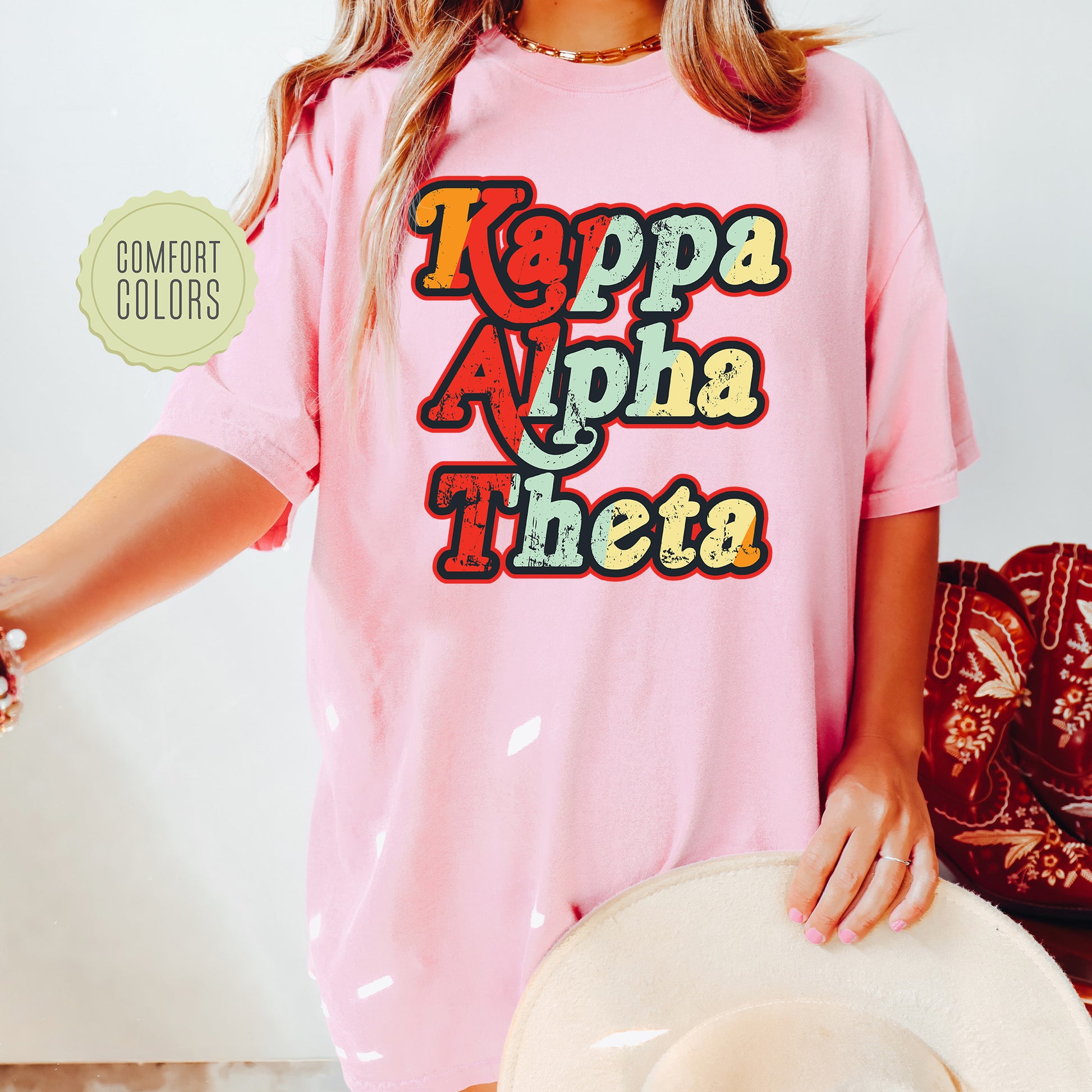 a woman wearing a pink shirt and hat