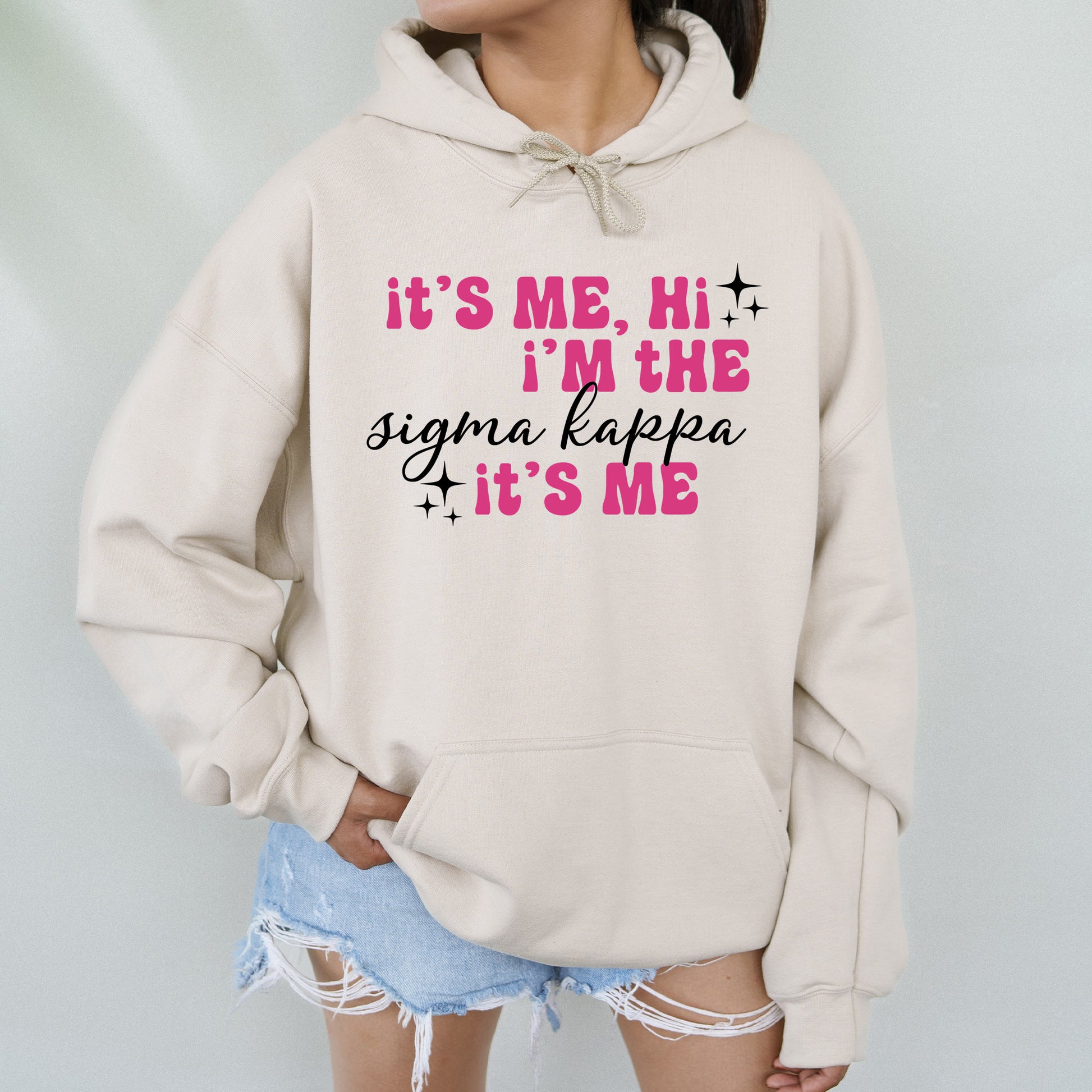a woman wearing a sweatshirt that says it's me, i'm the