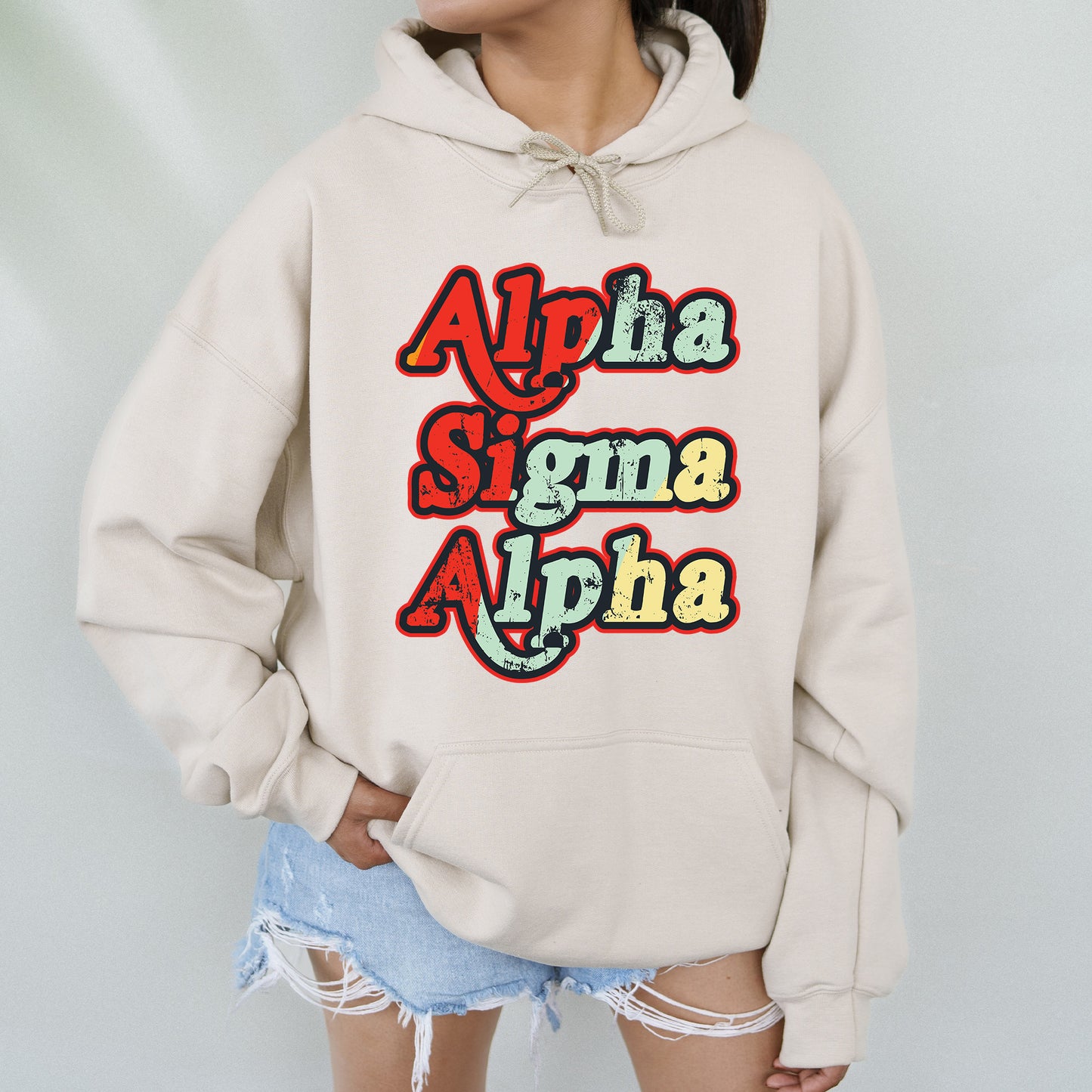 a woman wearing a white sweatshirt with the words aloha and aloha