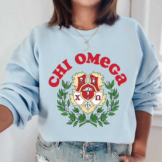 a woman wearing a blue sweatshirt with a crest on it