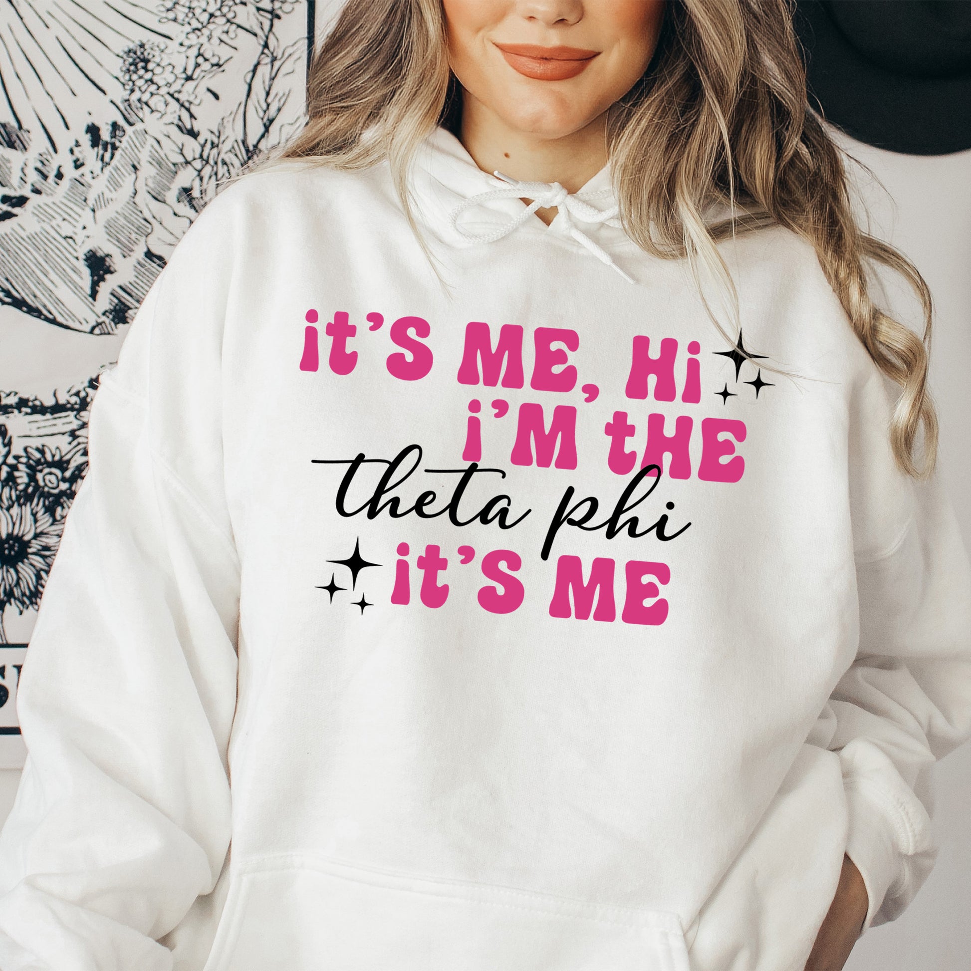 a woman wearing a white hoodie that says it's me, i '