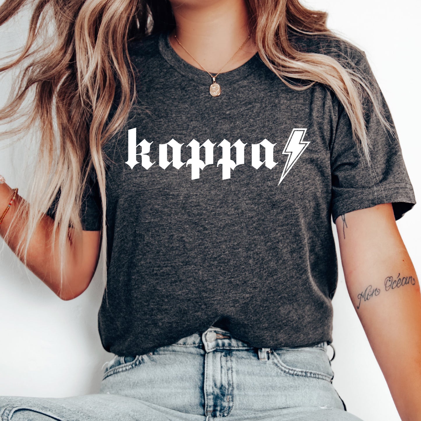a woman wearing a shirt that says kappo