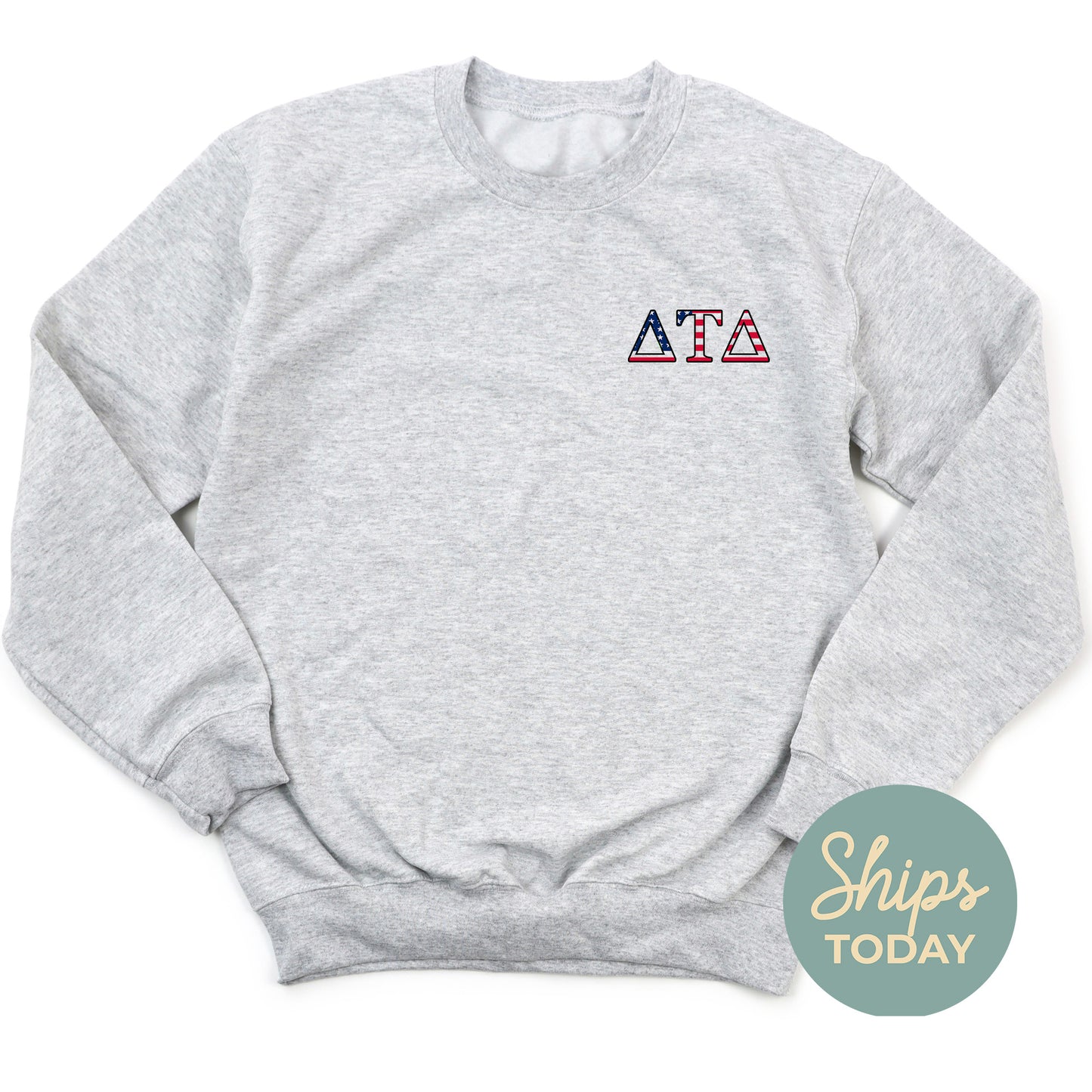 a gray sweatshirt with the letters atta on it