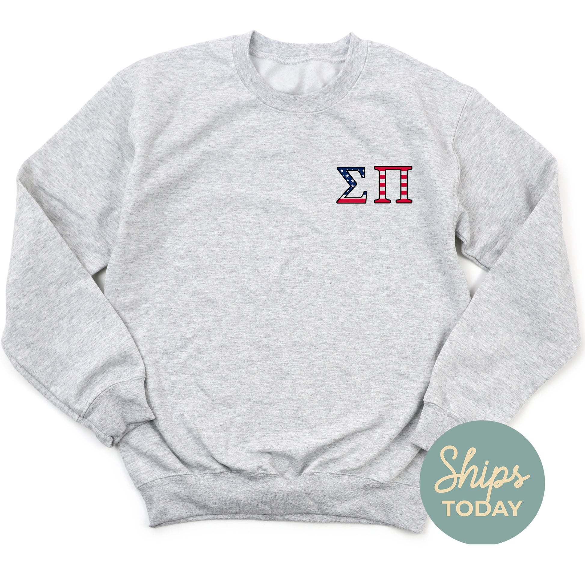a sweatshirt with the letter k in red, white, and blue