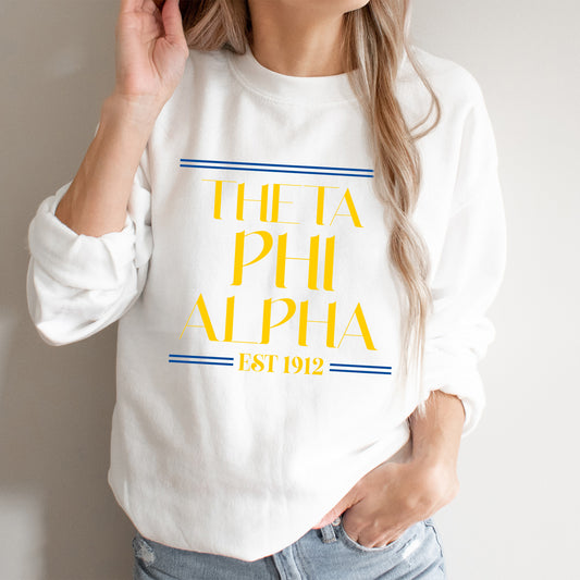 a woman wearing a white sweatshirt with the words, the la phia, established