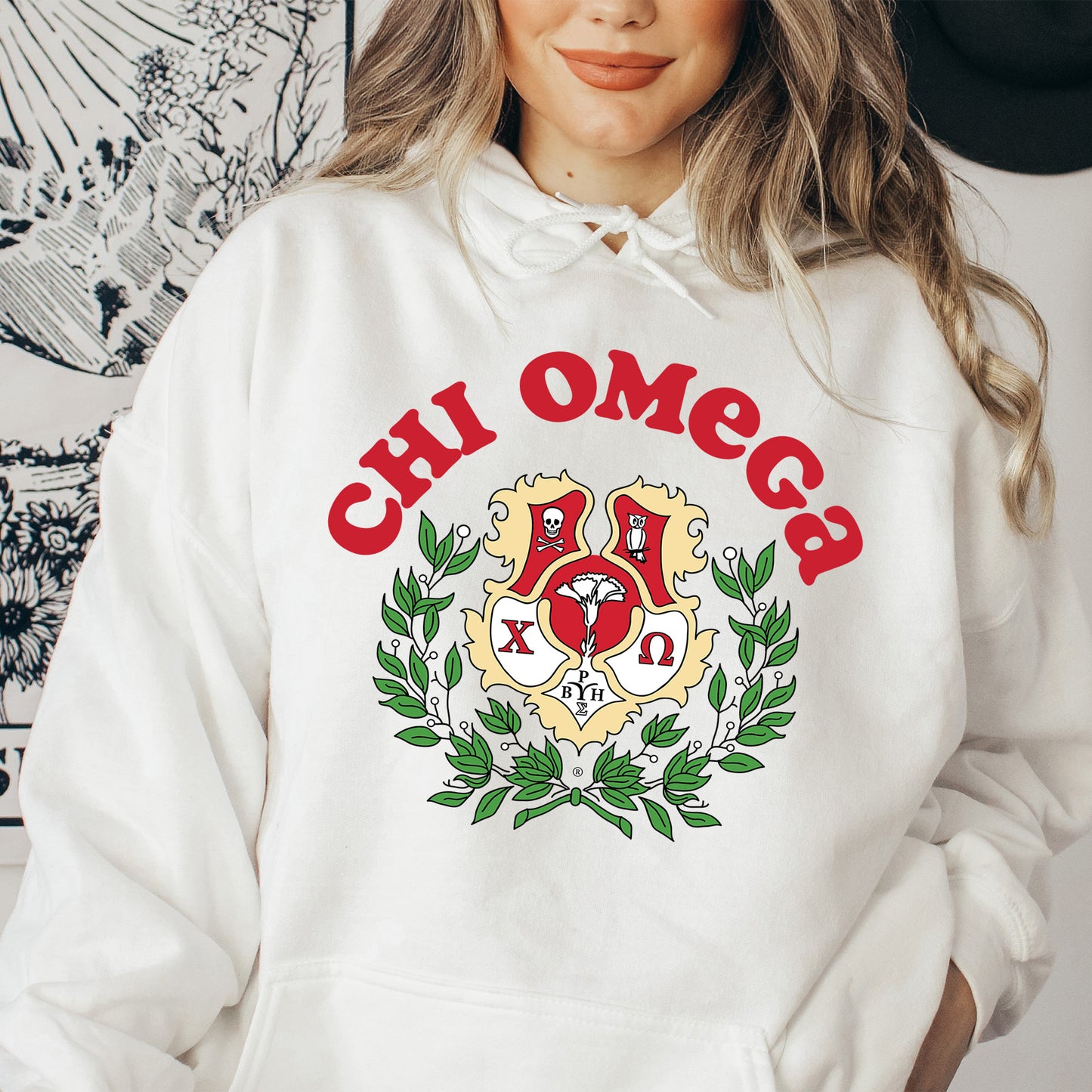 a woman wearing a white hoodie with the word oh omegs on it